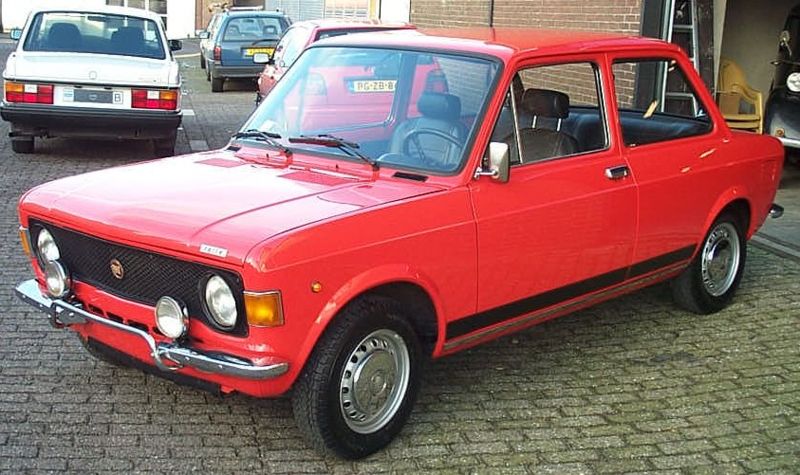 Fiat 128 BMW X6: Fiat 128.