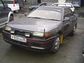 Mazda Familia Новые и БУ Lancia Delta: Mazda Familia.